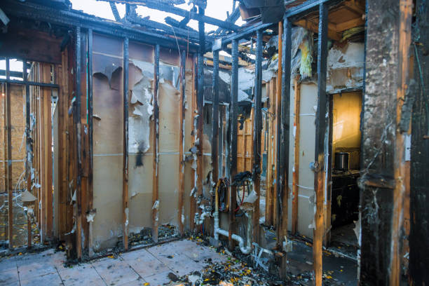 Professional Fire Damage Restoration technician working in South Lancaster, MA